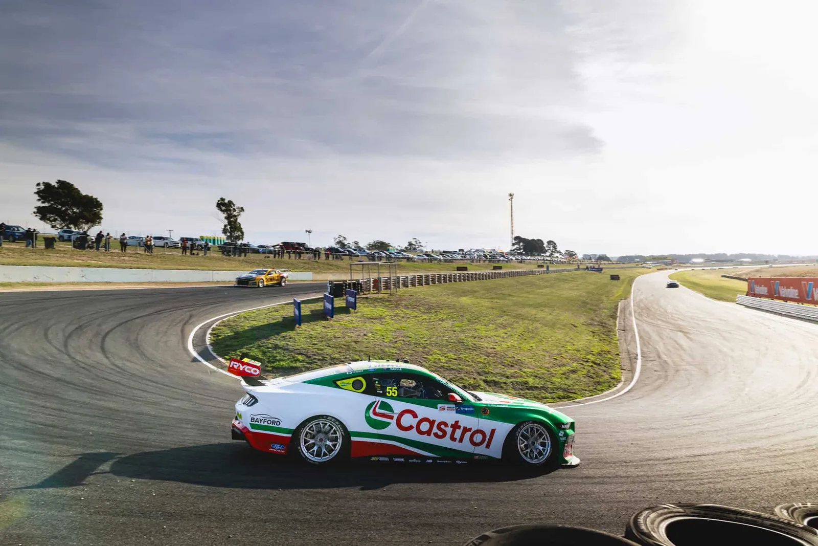Castrol liveried Supercar in the pit garage